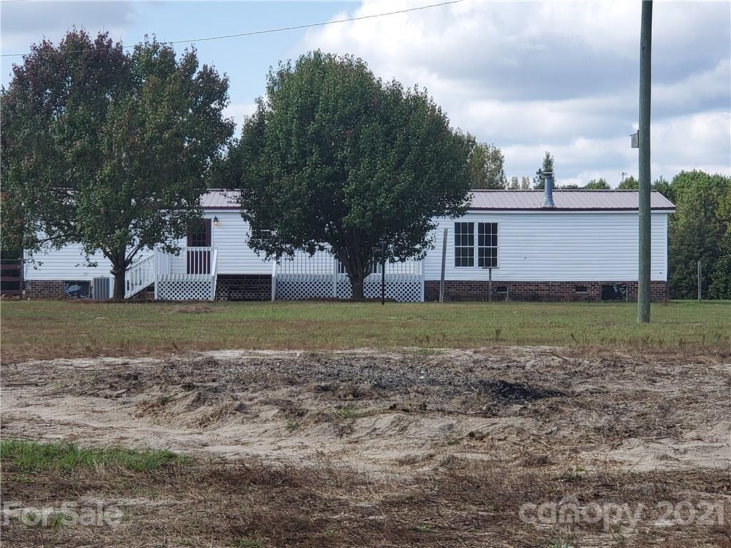 1282 Macedonia-Angelus Road Jefferson, SC 29718 - Photo 4 of 26 a view of a house with a yard