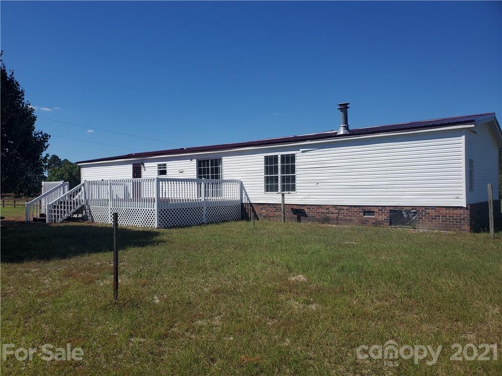 1282 Macedonia-Angelus Road Jefferson, SC 29718 - Photo 5 of 26 a house view with a backyard space