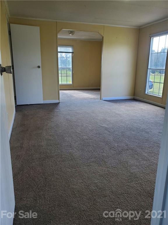 1282 Macedonia-Angelus Road Jefferson, SC 29718 - Photo 8 of 26 an empty room with windows