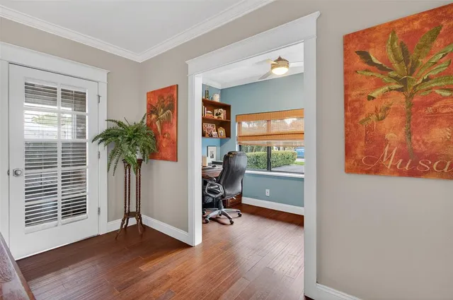 a view of a livingroom with furniture and a window