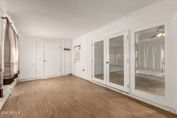 a view of an empty room and window