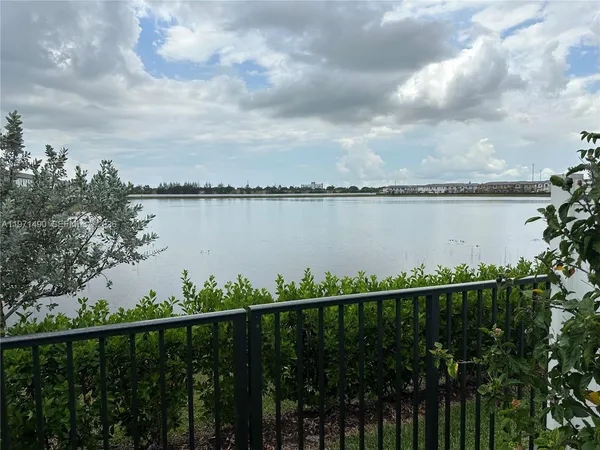a view of a lake from a balcony