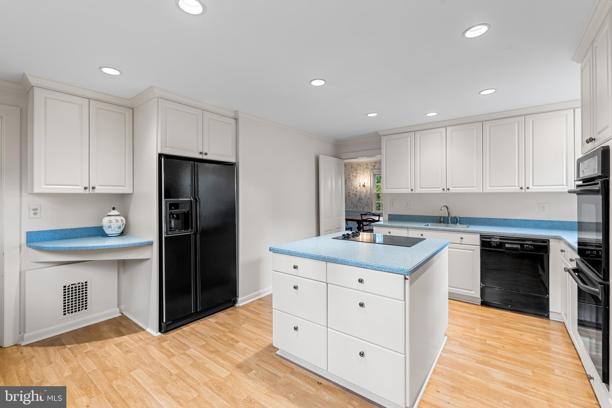 308 Northfield Place Baltimore, MD 21210 - Photo 13 of 41 a kitchen with a stove a refrigerator and a sink
