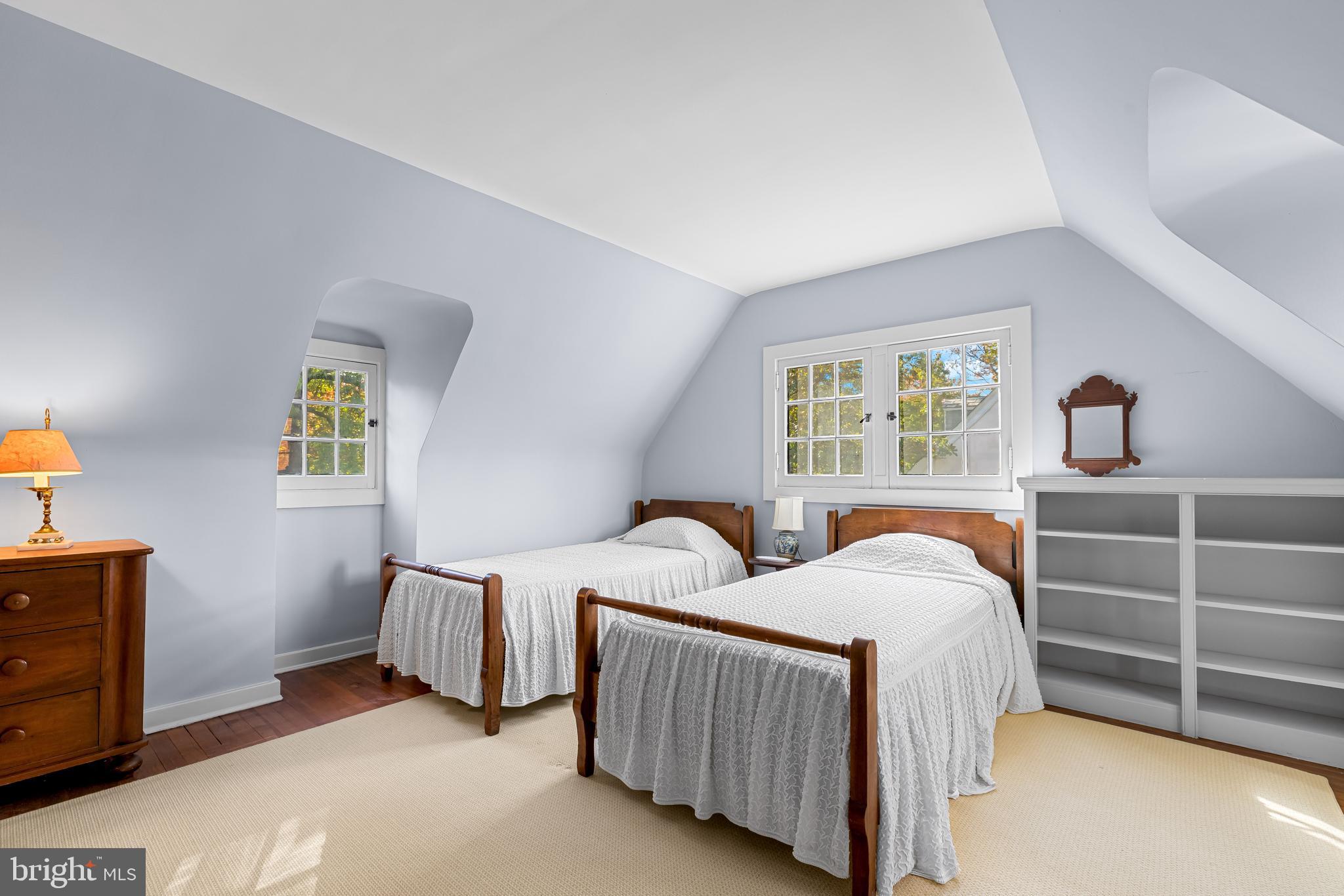 308 Northfield Place Baltimore, MD 21210 - Photo 30 of 41 a bedroom with two beds and a window