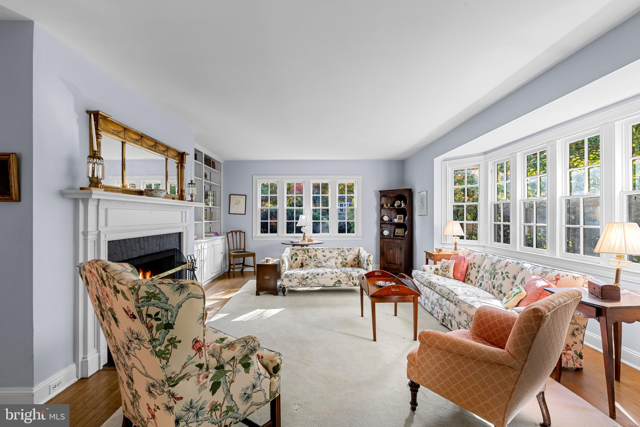 308 Northfield Place Baltimore, MD 21210 - Photo 6 of 41 a living room with furniture large window and a fireplace