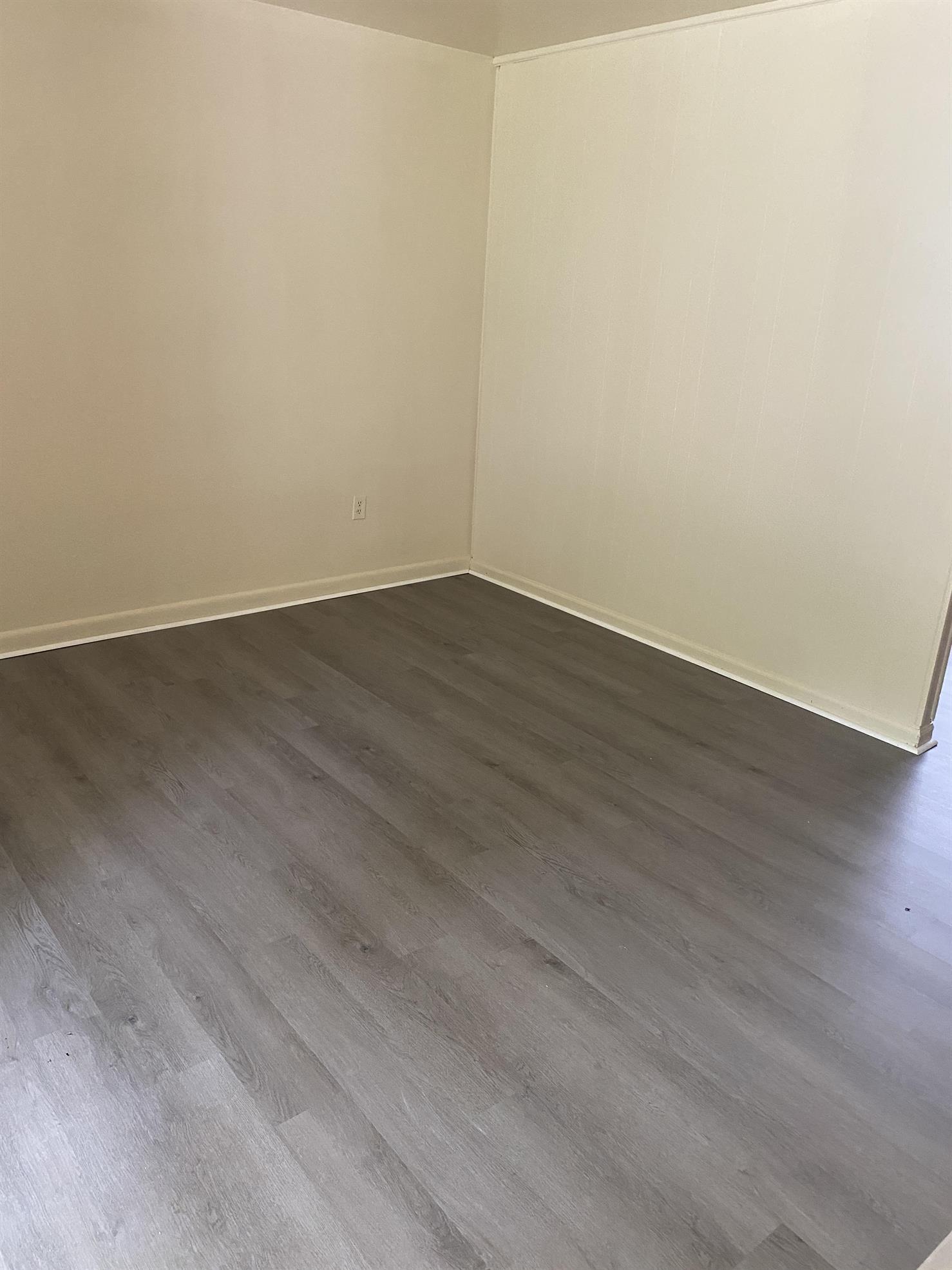 200 Ridgeview Lane, Unit 53 Bassett, VA 24055 - Photo 7 of 10 an empty room with wooden floor