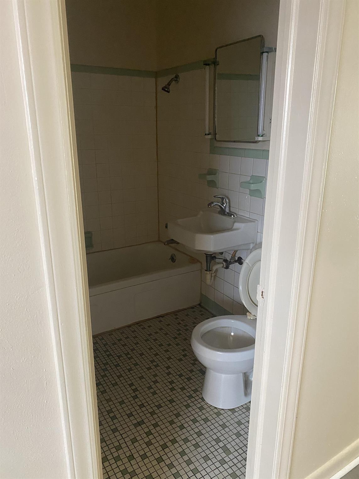 200 Ridgeview Lane, Unit 53 Bassett, VA 24055 - Photo 10 of 10 a bathroom with a granite countertop toilet and a shower