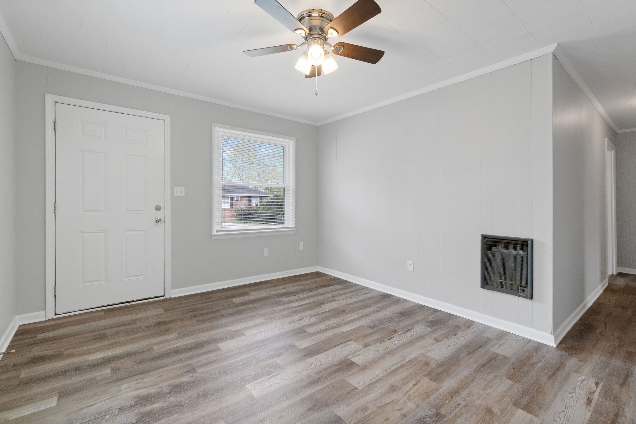 427 Circle Drive, Unit B Clarksville, TN 37043 - Photo 5 of 10 wooden floor in an empty room with a window