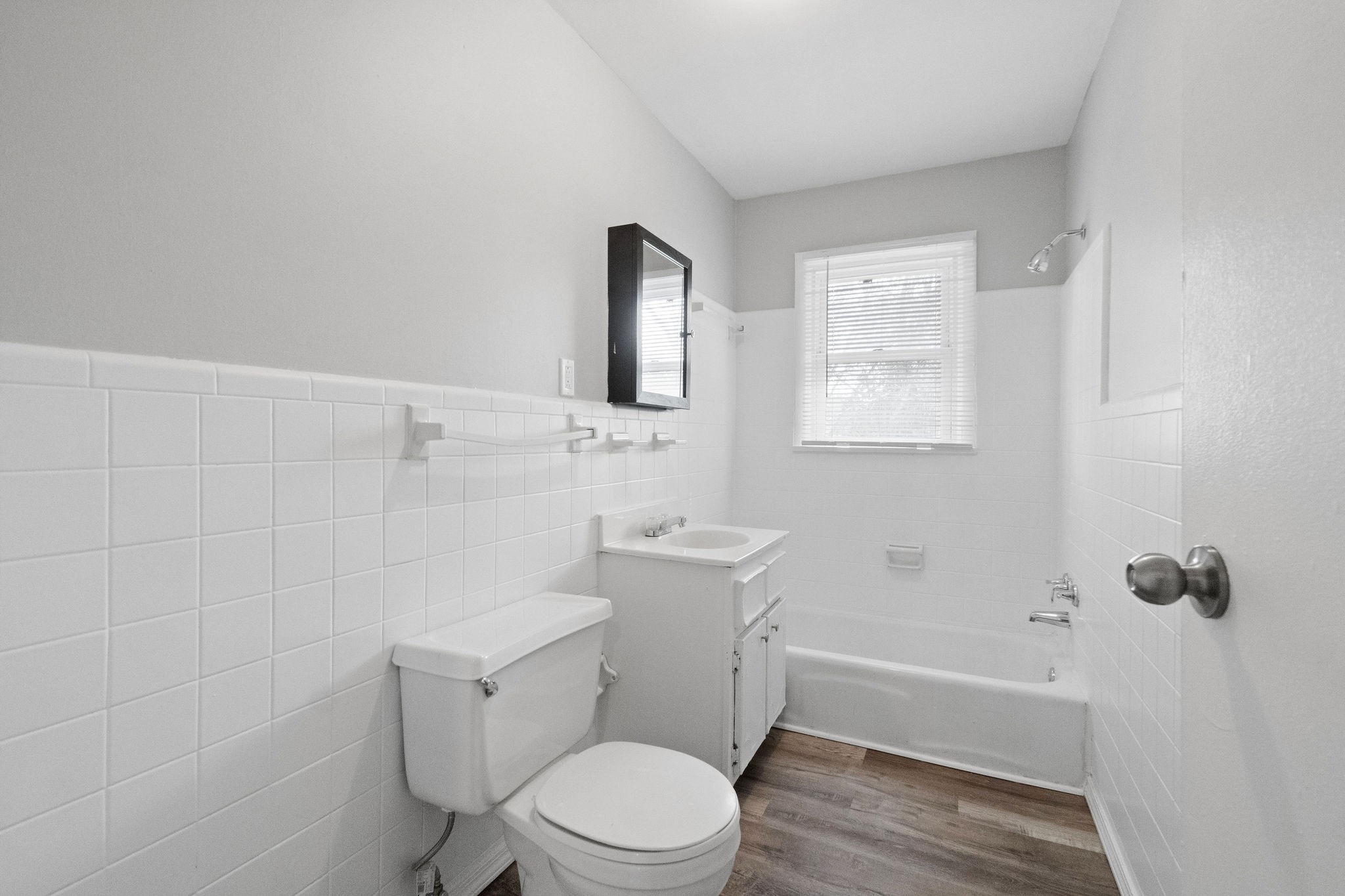 427 Circle Drive, Unit B Clarksville, TN 37043 - Photo 10 of 10 a white toilet sitting next to a bath tub