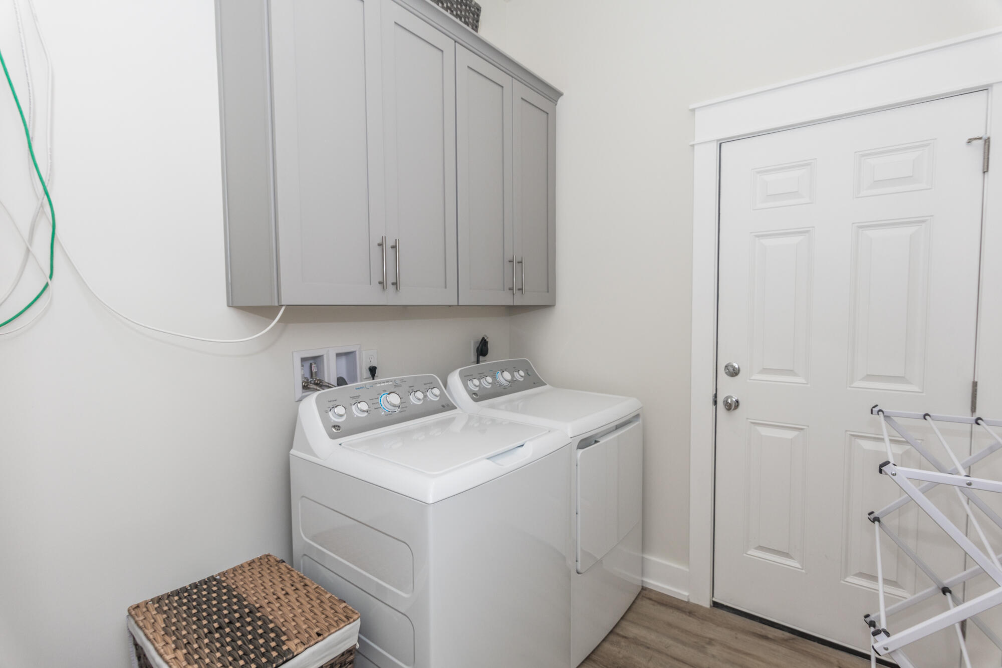 68 Beach View Drive Inlet Beach, FL 32461 - Photo 35 of 78 a utility room with cabinets washer and dryer