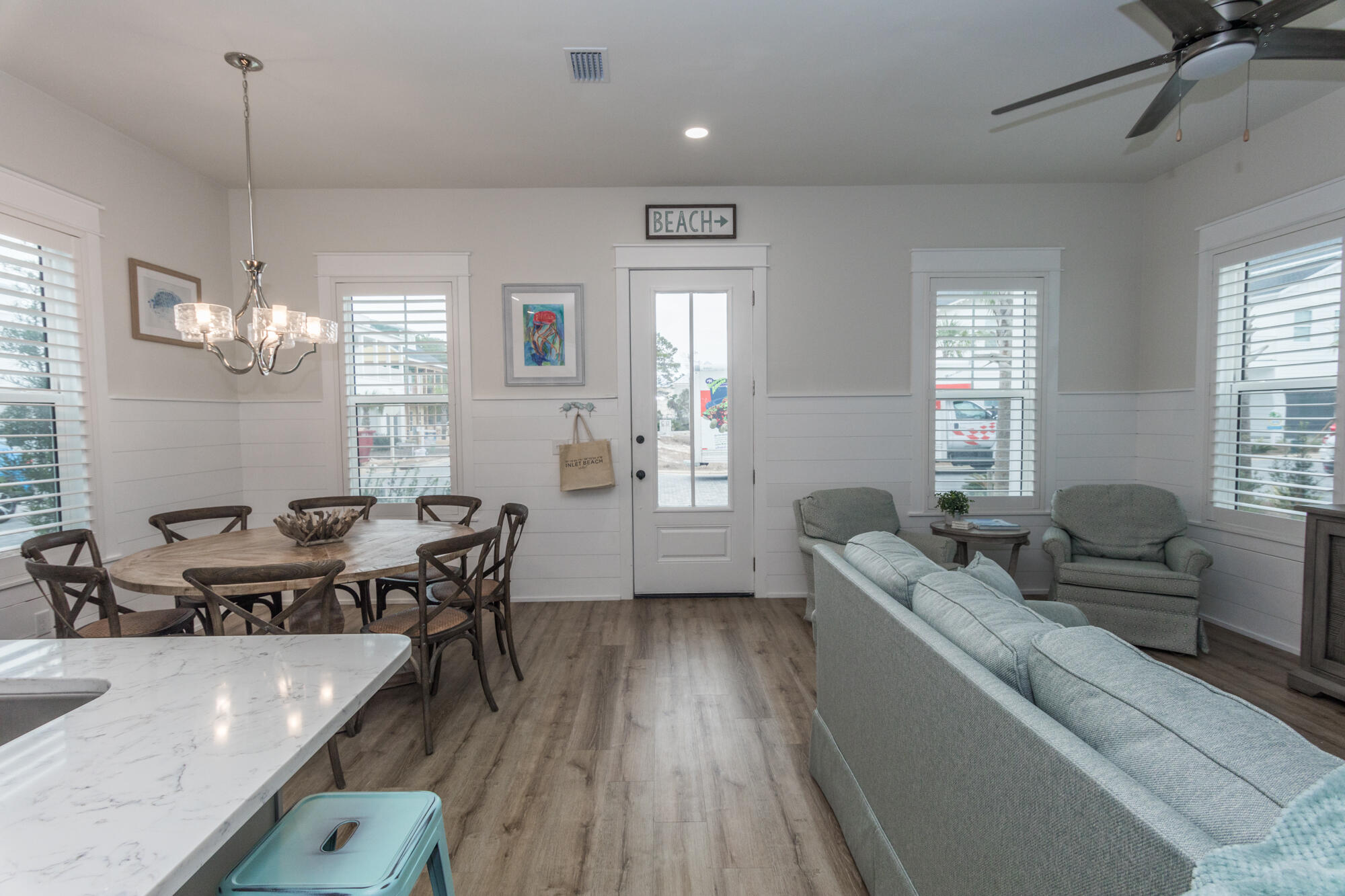 68 Beach View Drive Inlet Beach, FL 32461 - Photo 4 of 78 a living room with furniture and a chandelier