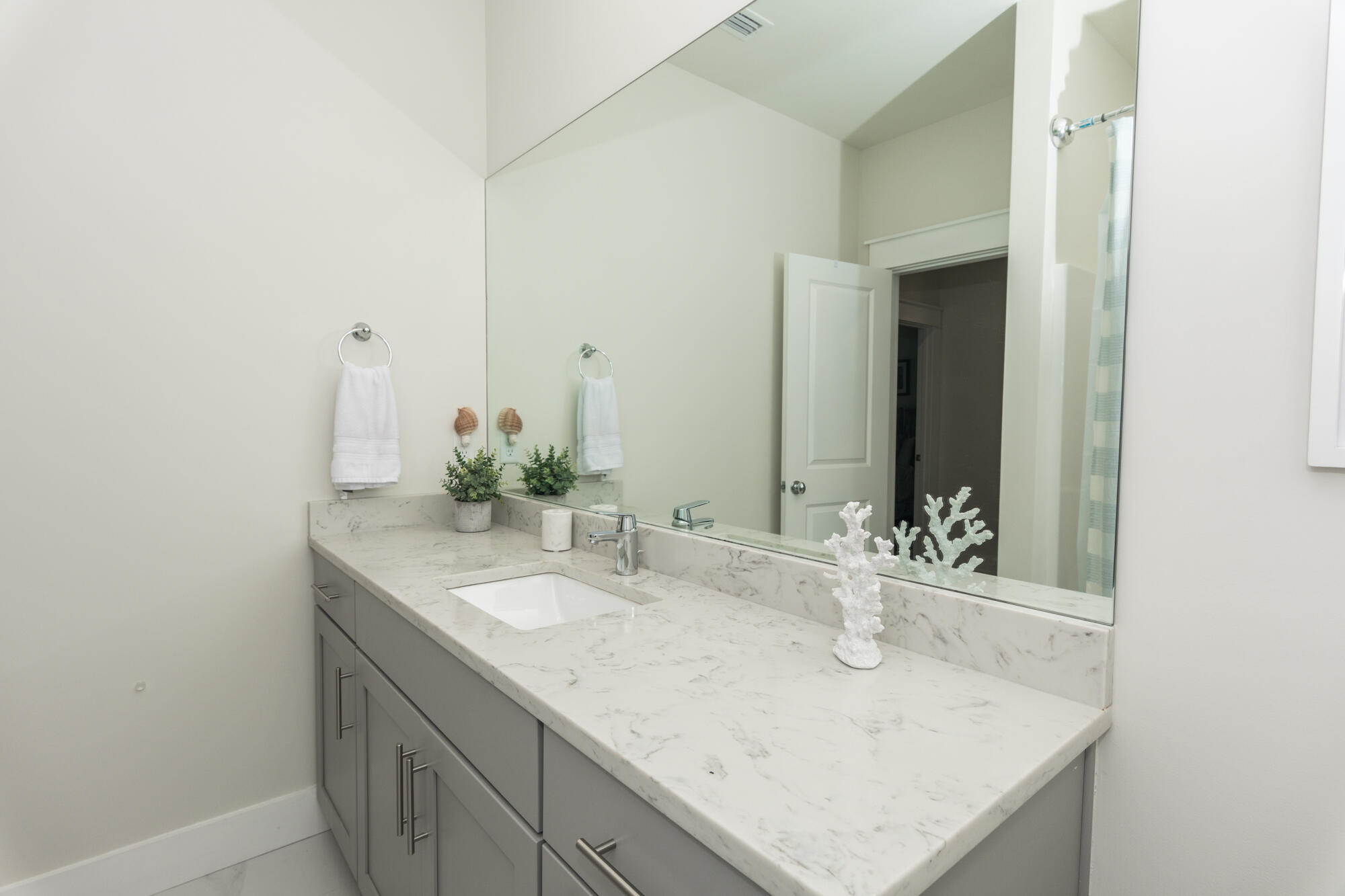 68 Beach View Drive Inlet Beach, FL 32461 - Photo 42 of 78 a bathroom with a sink and a mirror