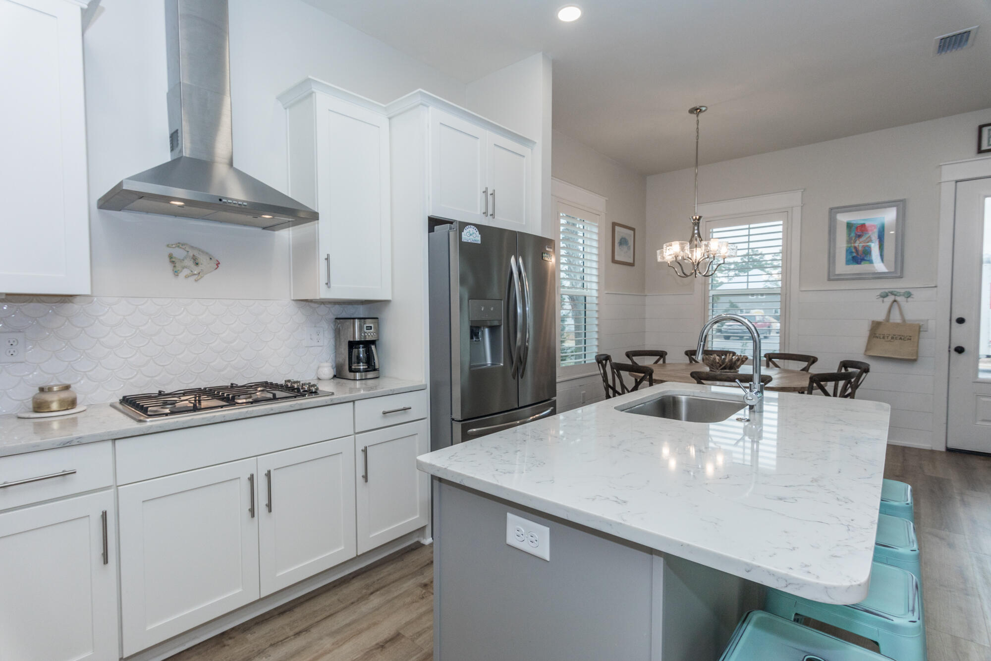 68 Beach View Drive Inlet Beach, FL 32461 - Photo 7 of 78 a kitchen with stainless steel appliances a sink stove and refrigerator