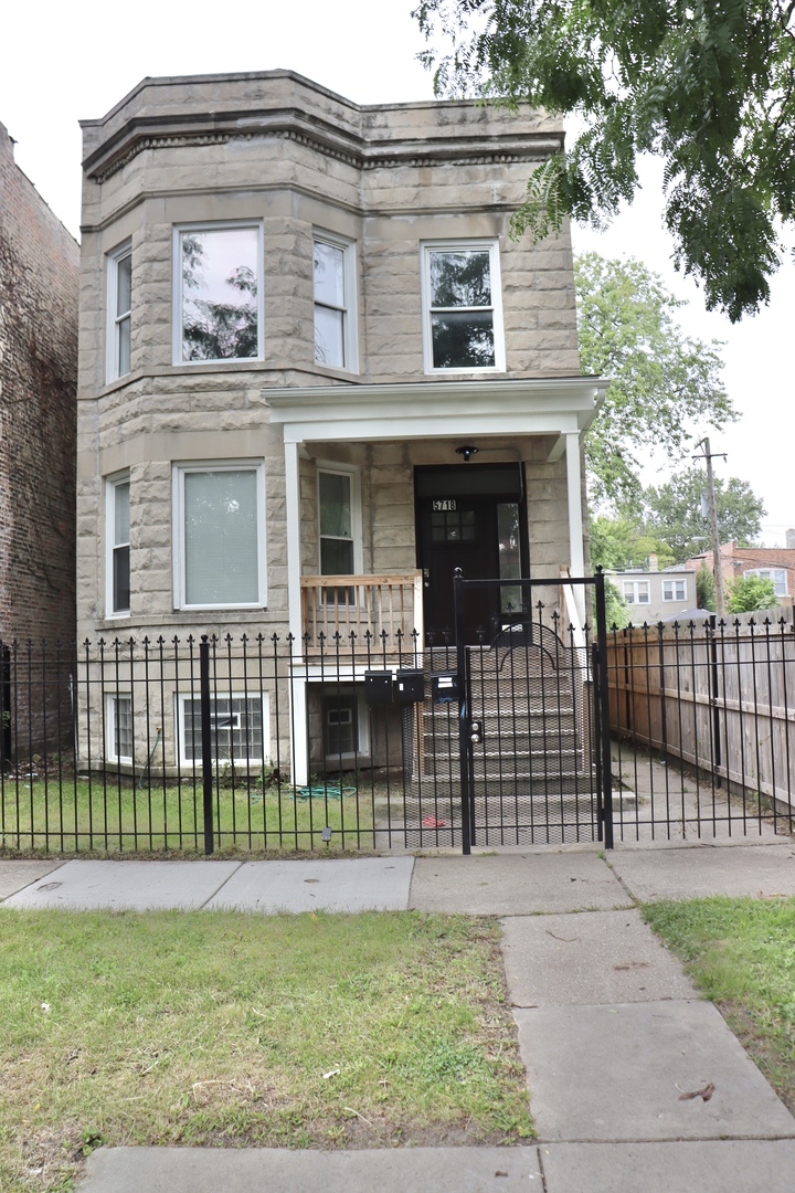 5718 South Sangamon Street, Unit 2 Chicago, IL 60621 - Photo 1 of 35 front view of a house