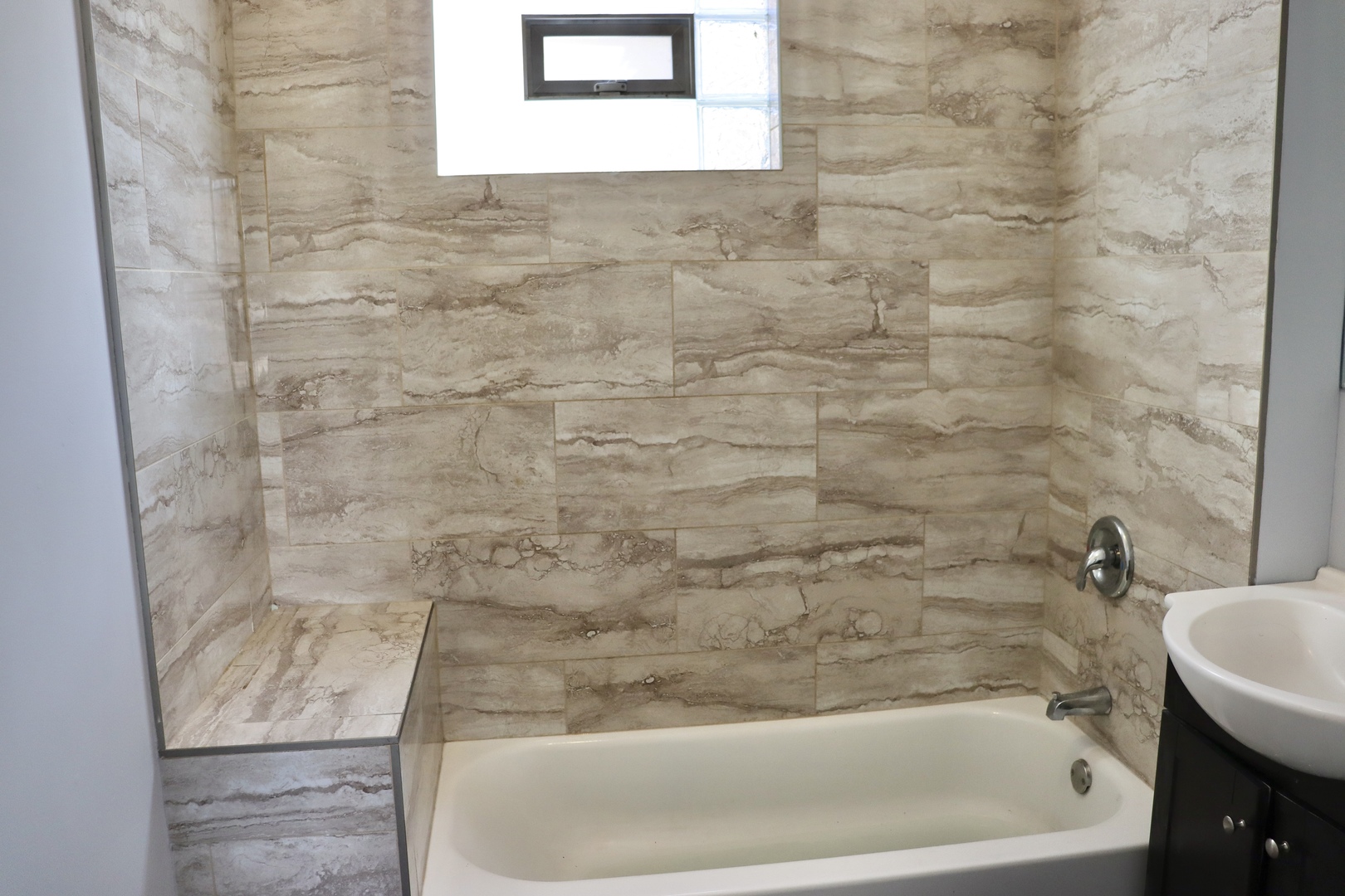 5718 South Sangamon Street, Unit 2 Chicago, IL 60621 - Photo 27 of 35 a bathroom with a bathtub
