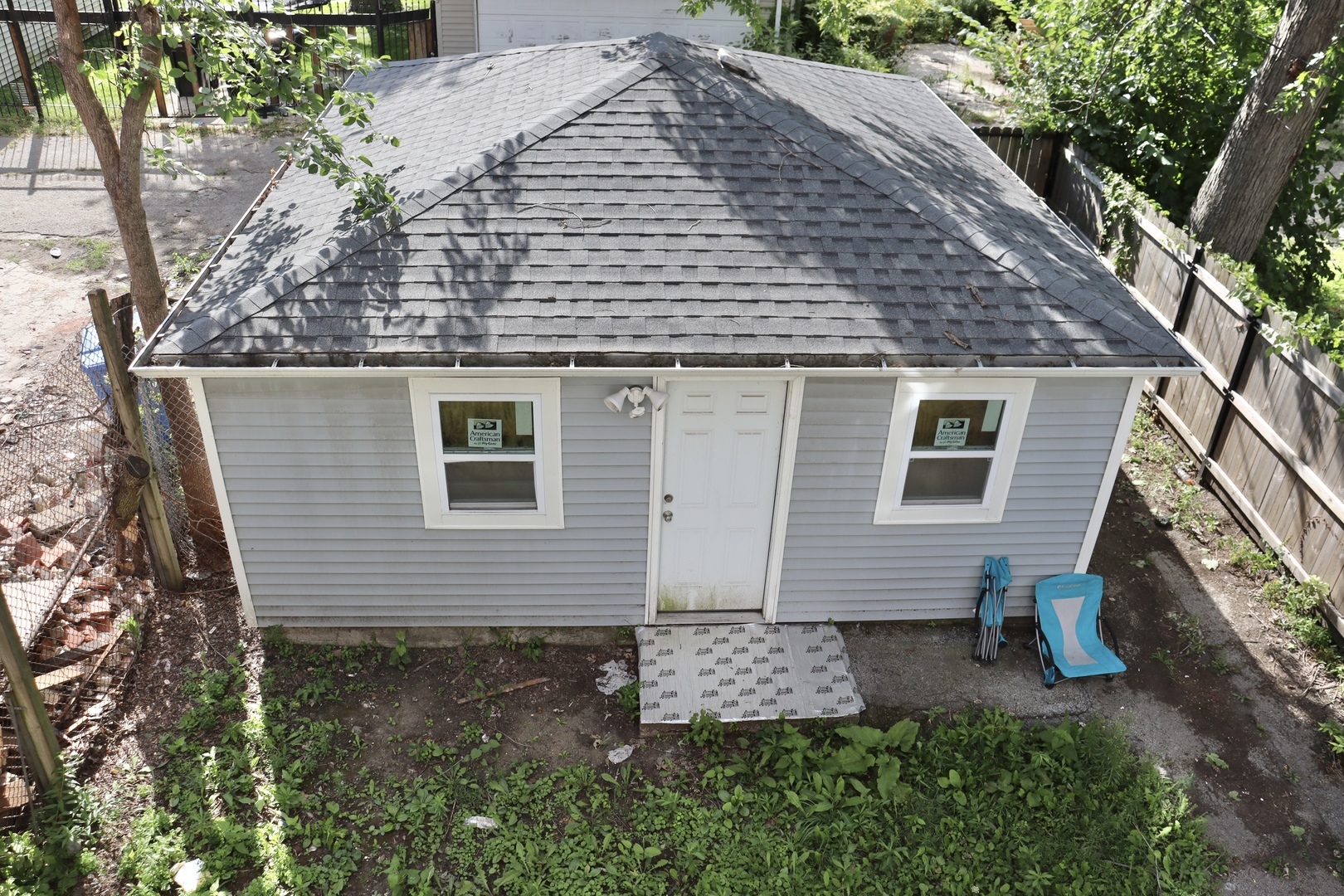 5718 South Sangamon Street, Unit 2 Chicago, IL 60621 - Photo 35 of 35 a view of a house with a yard