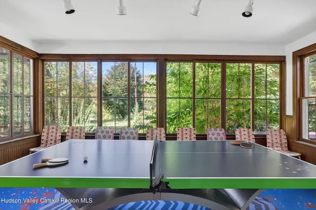 a view of a living room and kitchen
