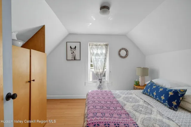 a view of room with window and front door