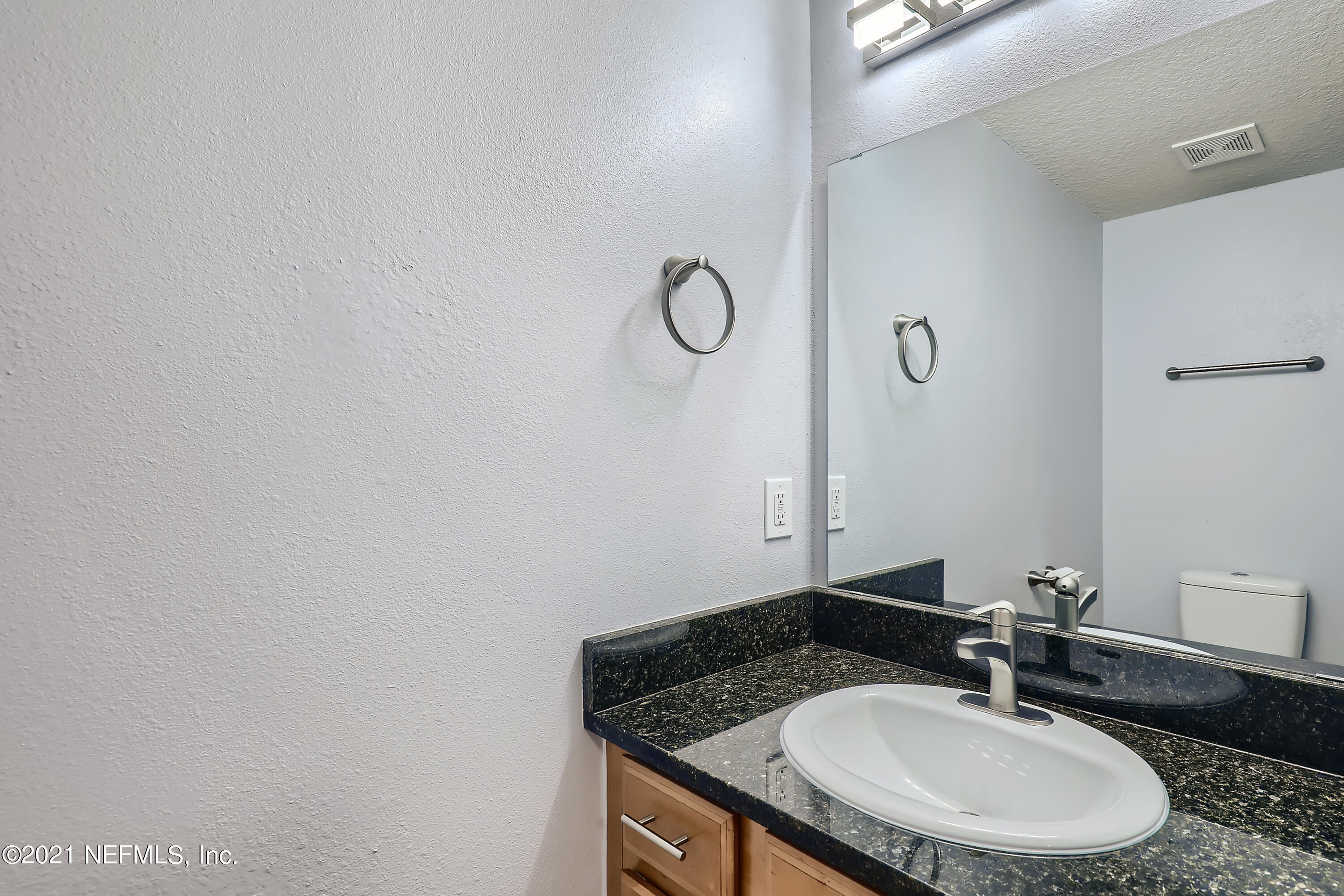 7915 Melvin Road Jacksonville, FL 32210 - Photo 13 of 32 12-682559278-29 Powder Room
