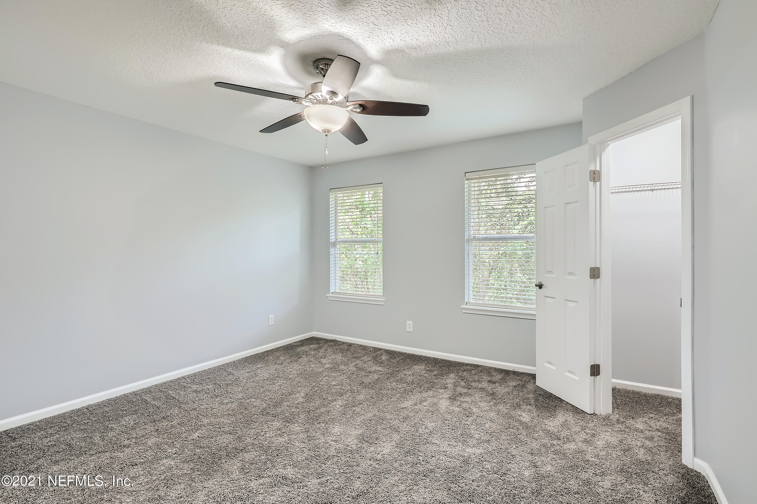 7915 Melvin Road Jacksonville, FL 32210 - Photo 14 of 32 13-957944387-31 2nd Floor Primary Bedroo