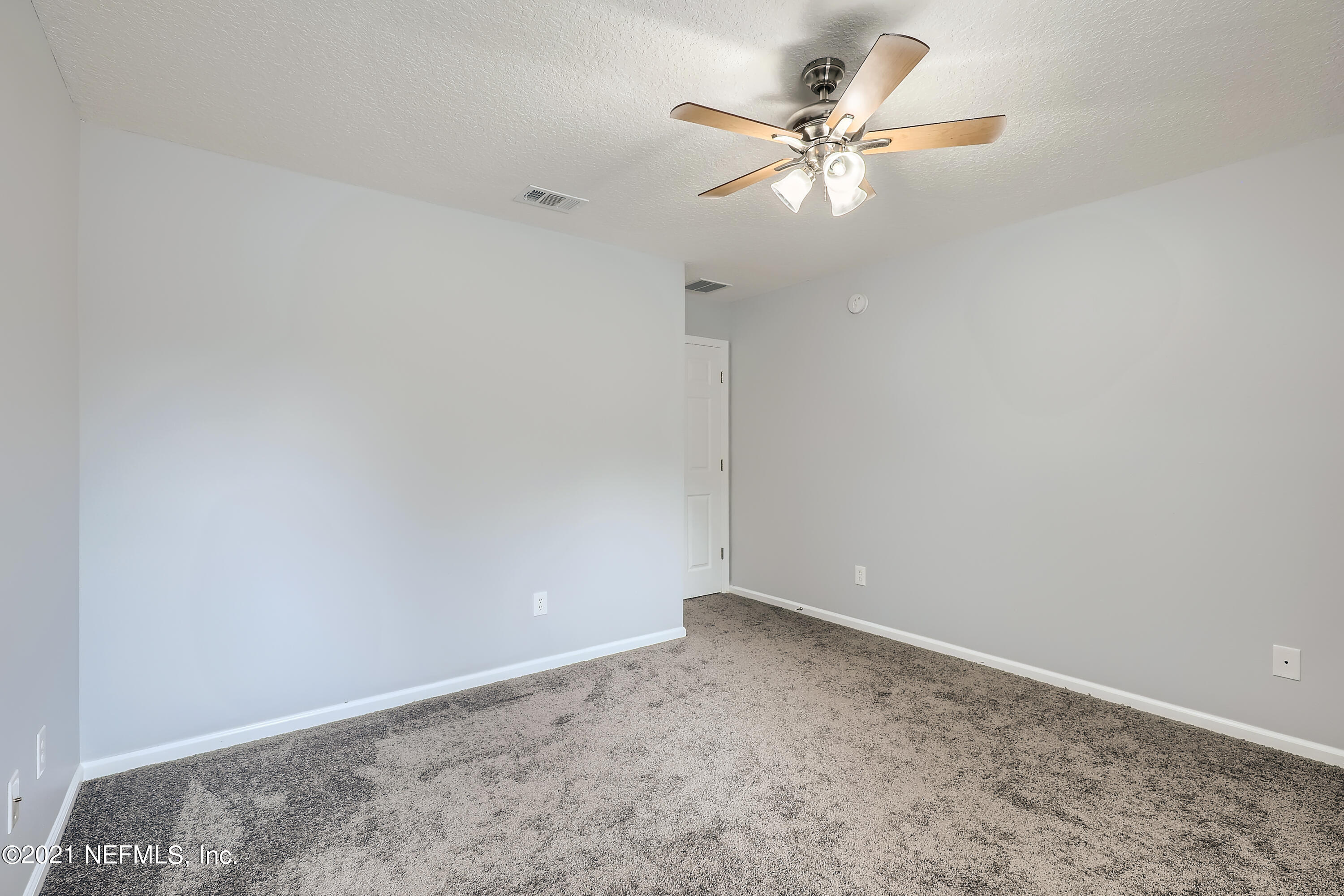 7915 Melvin Road Jacksonville, FL 32210 - Photo 24 of 32 23-087410029-45 2nd Floor Bedroom
