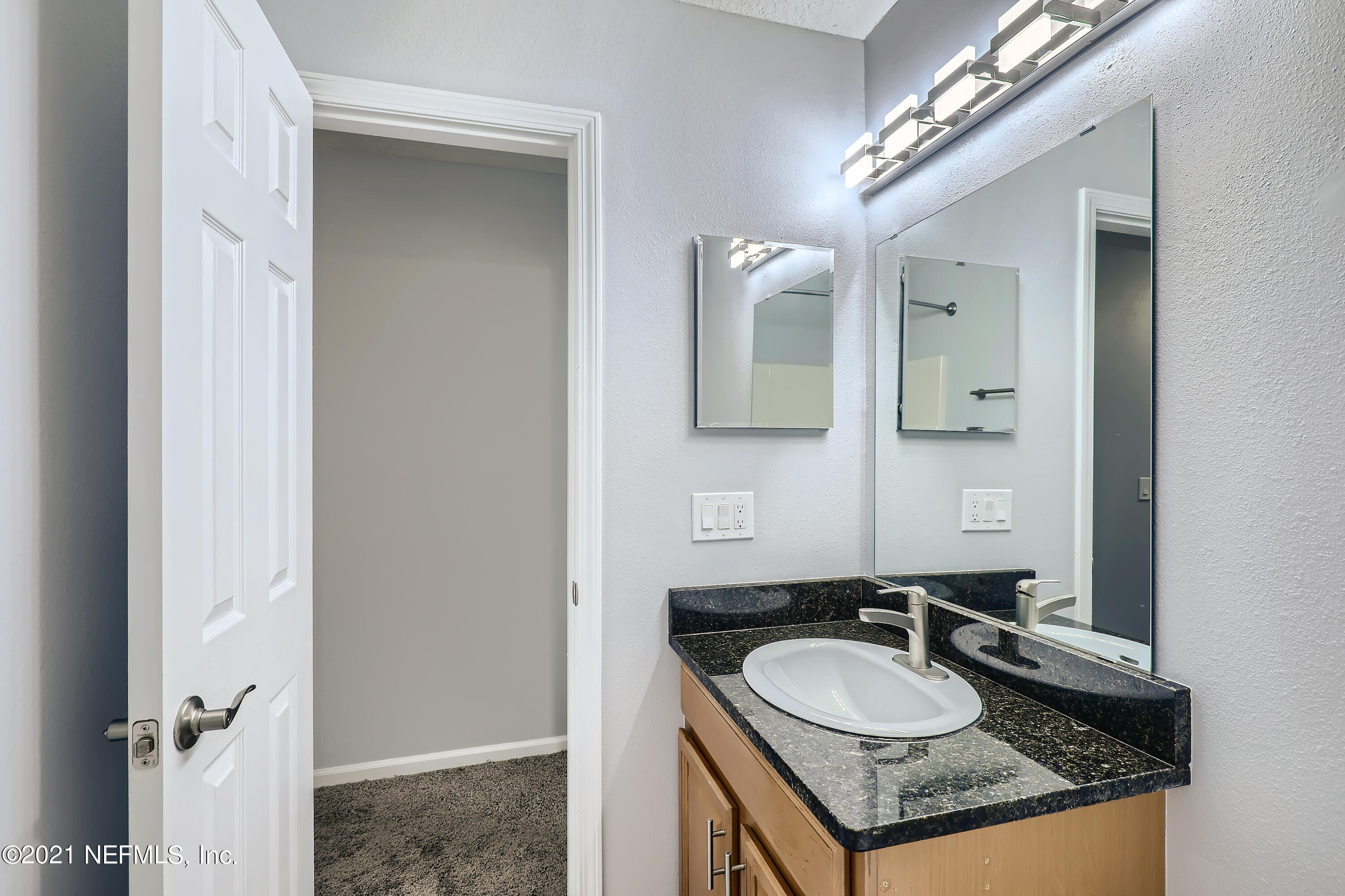 7915 Melvin Road Jacksonville, FL 32210 - Photo 27 of 32 26-601680796-49 2nd Floor Bathroom