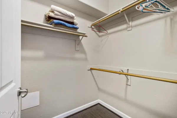 a view of a room with racks on the wall