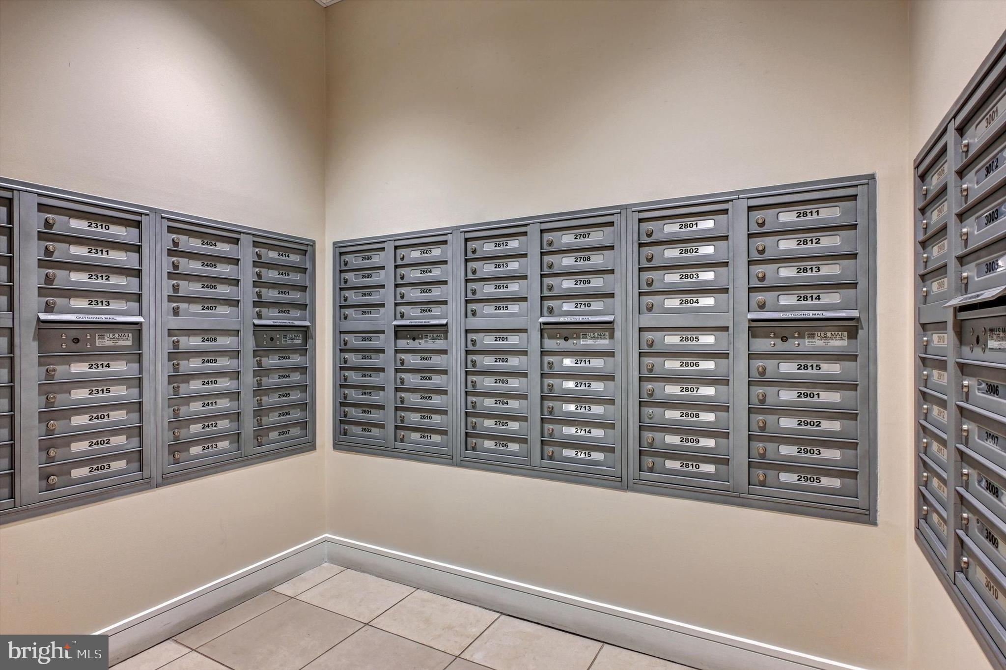 414 Water Street, Unit 2601 Baltimore, MD 21202 - Photo 48 of 51 a view of walk in closet with clothes and window
