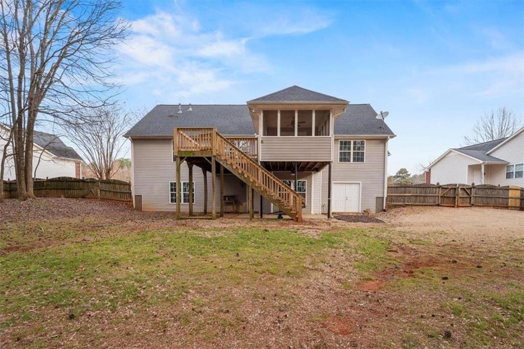 1218 Morgans Run Monroe, GA 30656 - Photo 38 of 39 a front view of a house with a yard