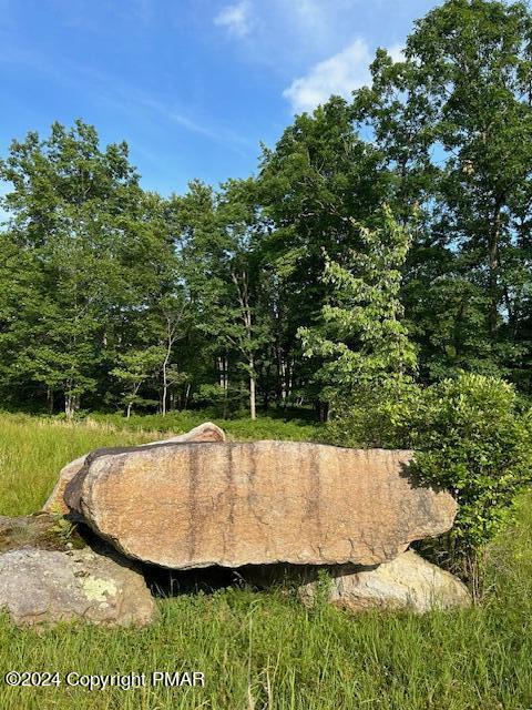 Pebble Beach Drive Hazleton, PA 18202 - Photo 3 of 9 a view of a swimming pool with a yard