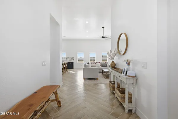 a living room with furniture and a window