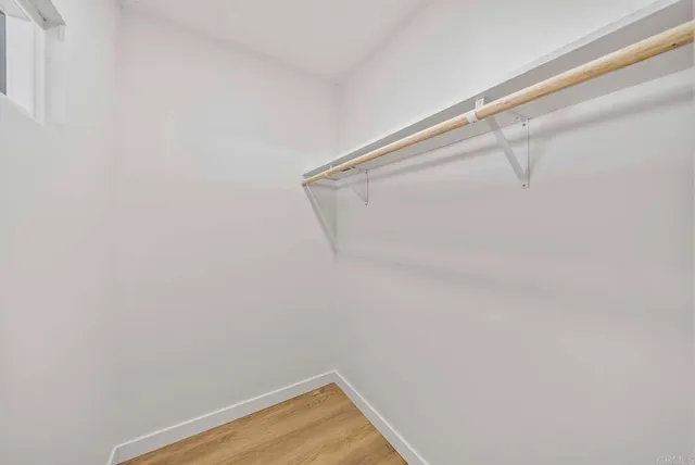 a view of a room with racks on the wall