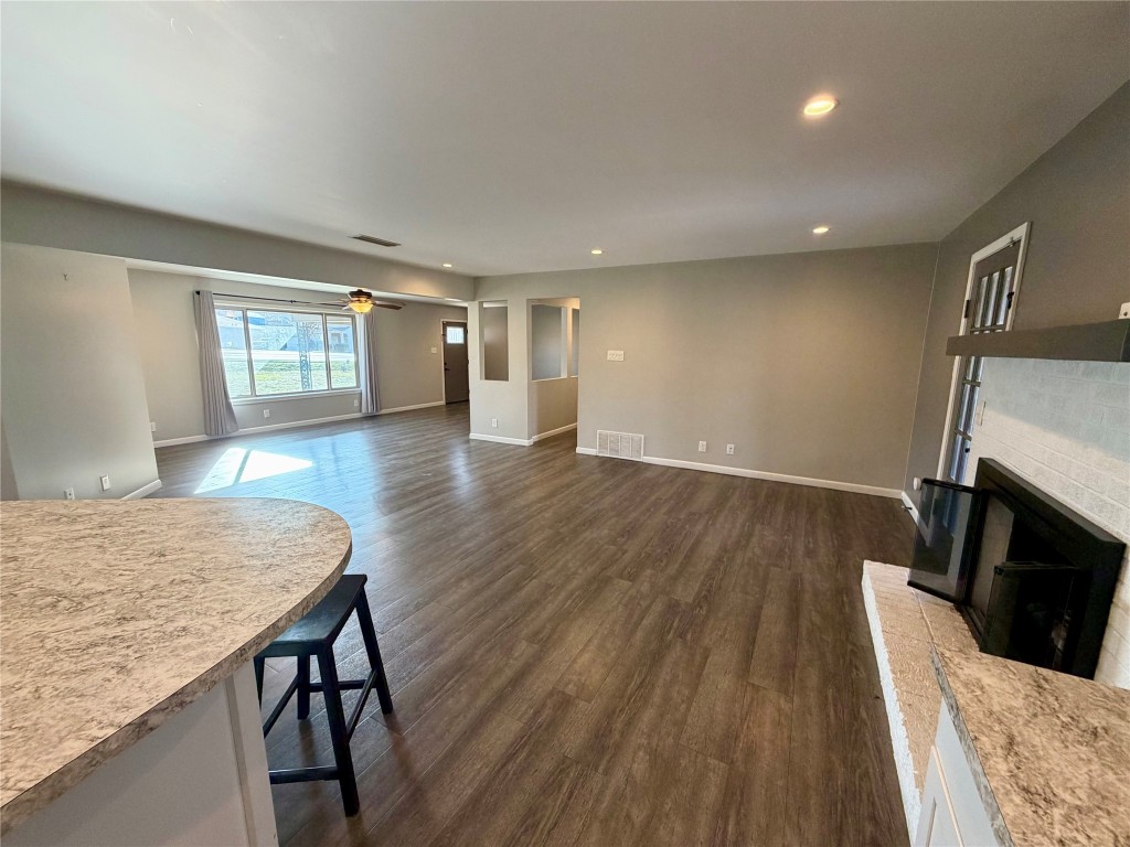 9712 Springdale Road Austin, TX 78754 - Photo 11 of 40 a view of livingroom with furniture and wooden floor