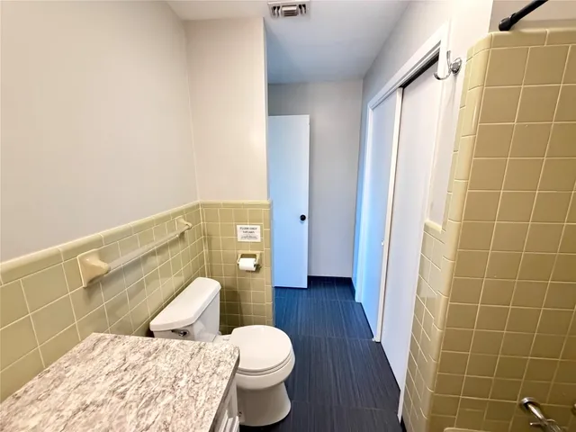 a bathroom with a sink and a toilet