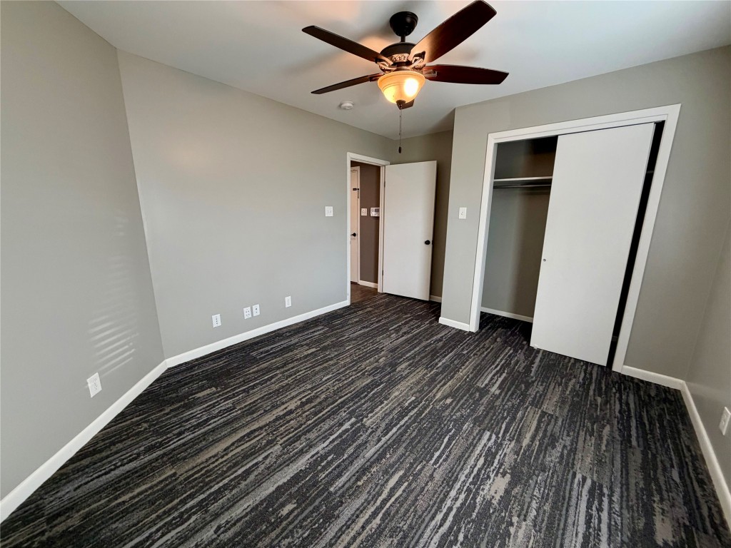 9712 Springdale Road Austin, TX 78754 - Photo 26 of 40 wooden floor in an empty room with a window