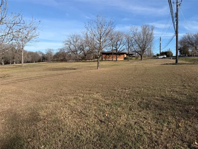 a view of road with trees