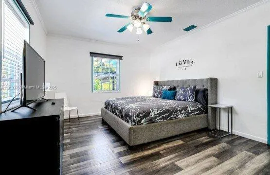 a bedroom with a bed and a table