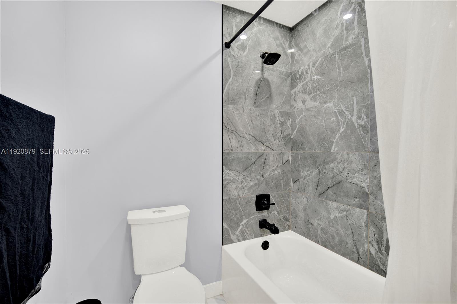 29472 Southwest 193rd Court Homestead, FL 33030 - Photo 26 of 44 a bathroom with a toilet and a shower
