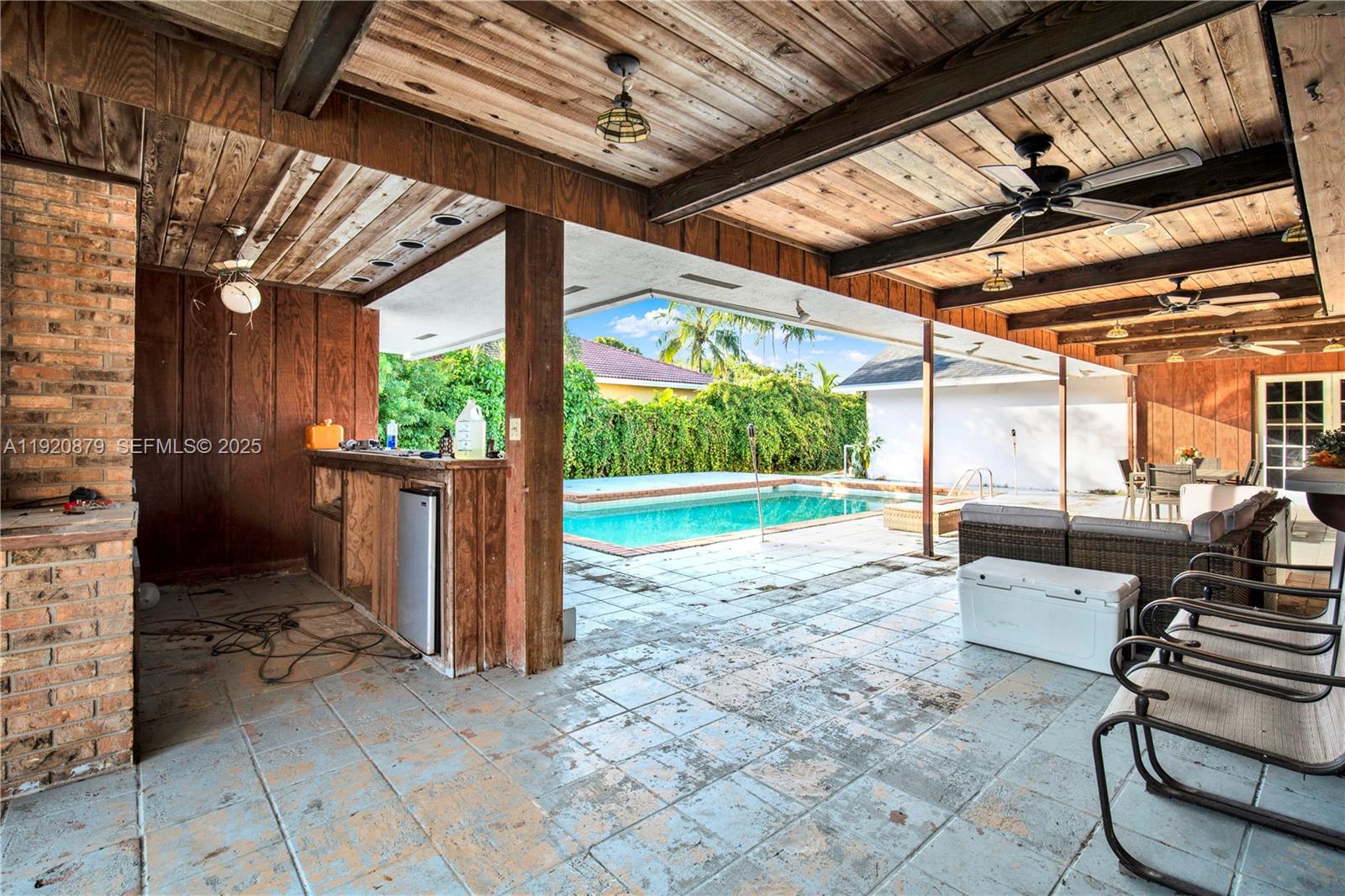 29472 Southwest 193rd Court Homestead, FL 33030 - Photo 38 of 44 a view of a porch with furniture and a backyard
