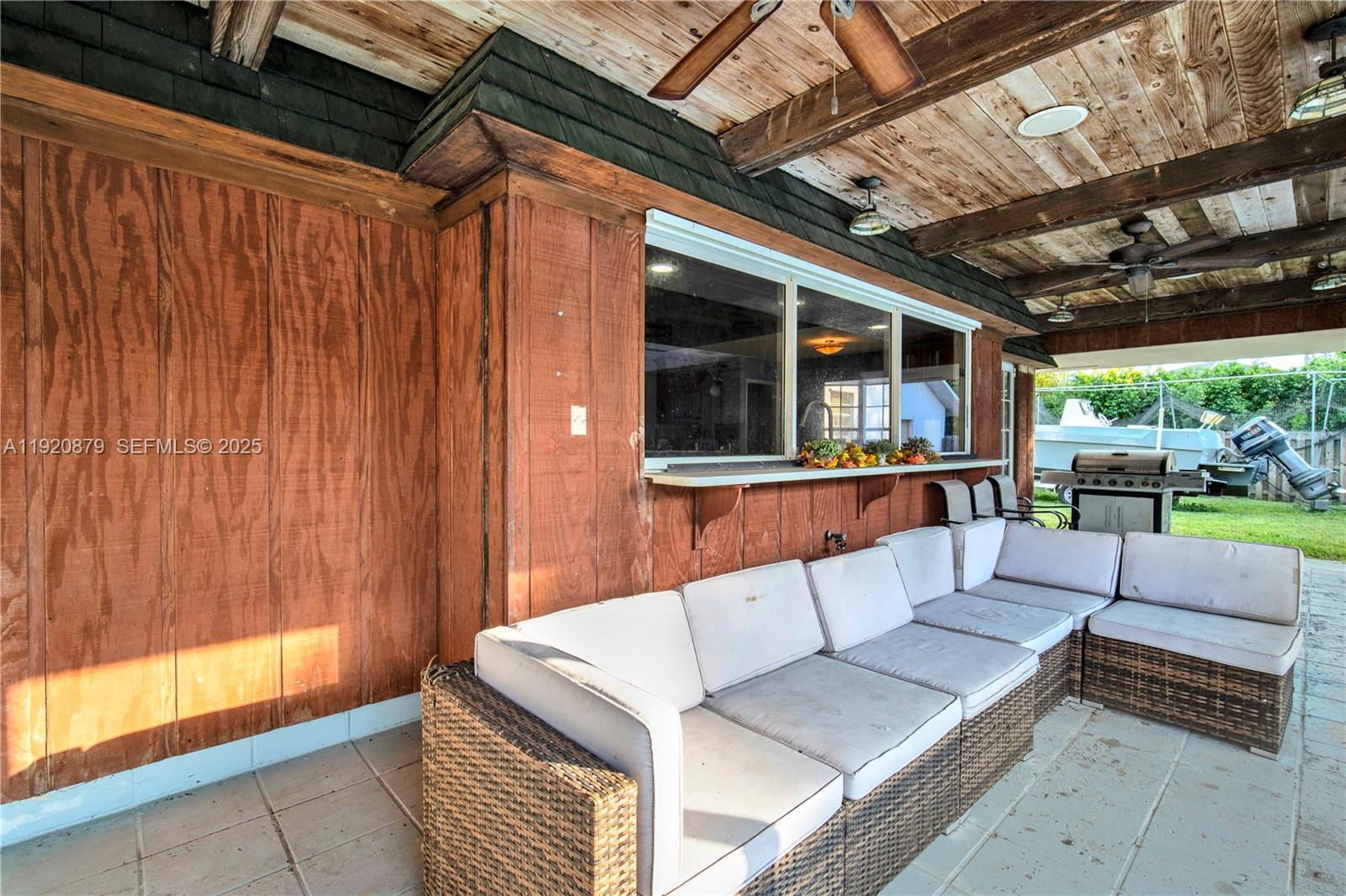 29472 Southwest 193rd Court Homestead, FL 33030 - Photo 39 of 44 a balcony with furniture and a potted plant