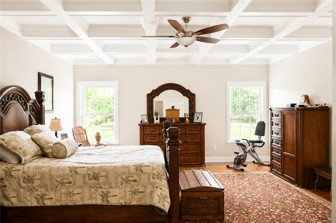 190 Fred Bradford Road Iva, SC 29655 - Photo 15 of 32 This spacious bedroom offers serene views and a decorative coffered ceiling.