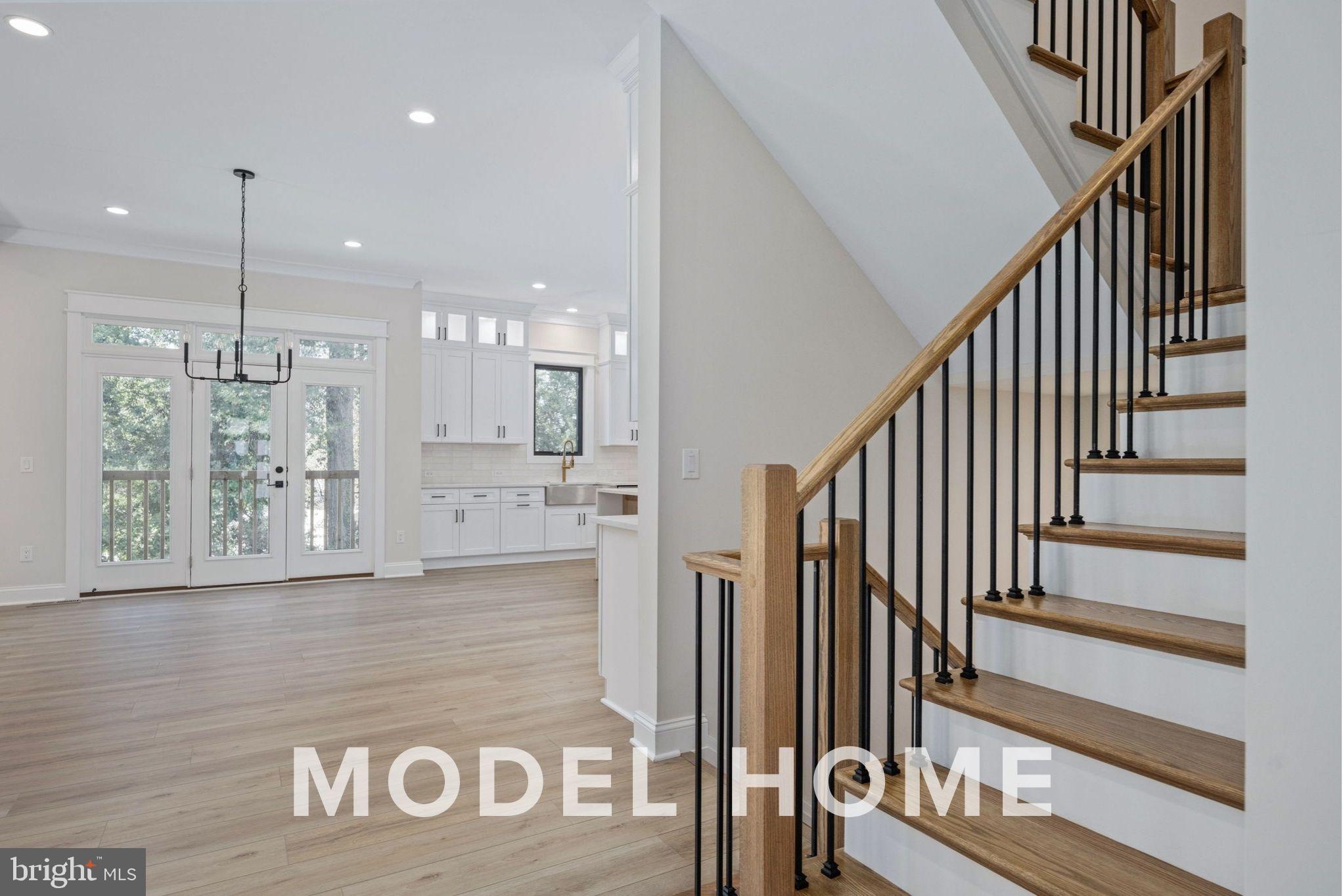 1901 Ware Road Falls Church, VA 22043 - Photo 11 of 39 a view of a kitchen with furniture and staircase