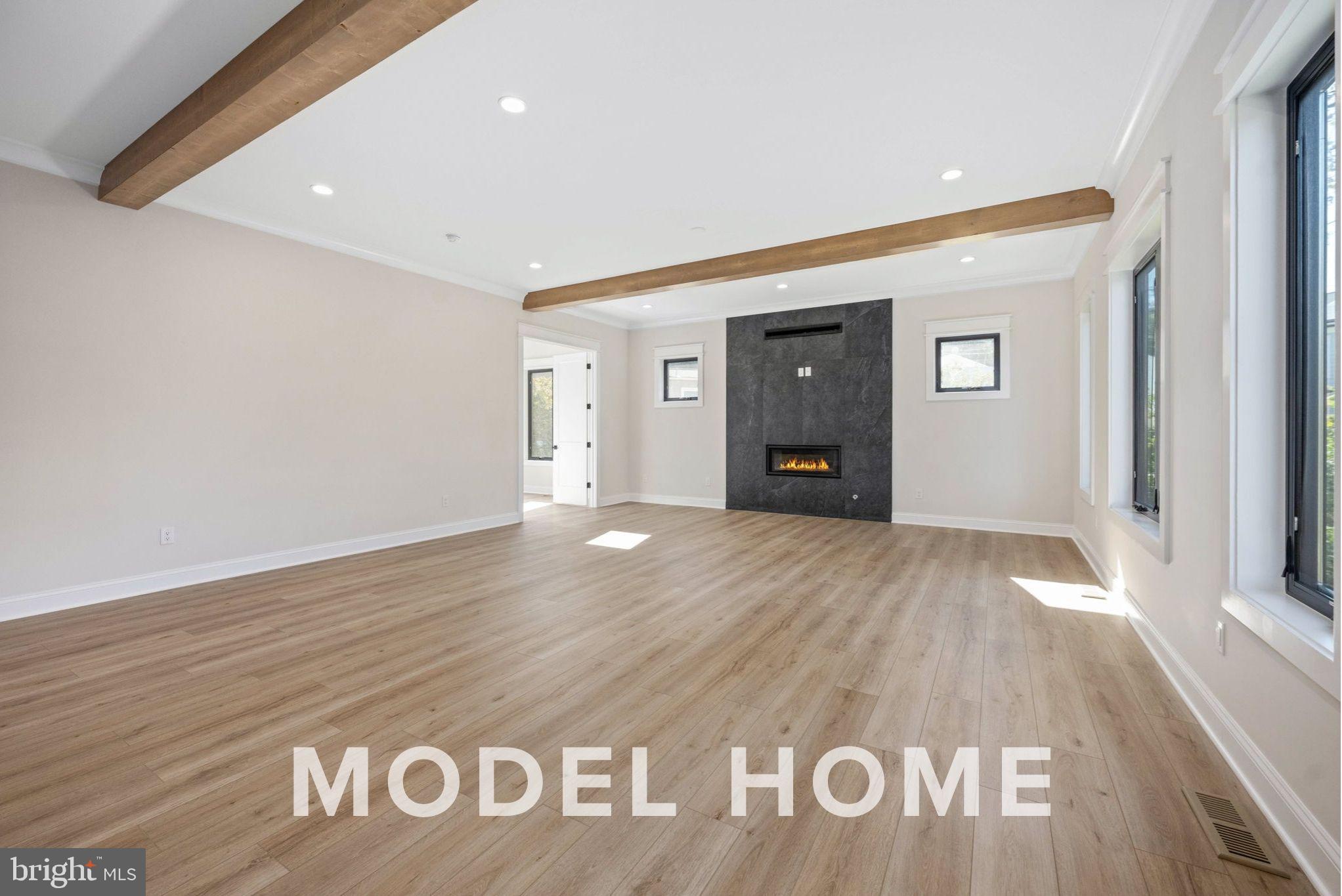 1901 Ware Road Falls Church, VA 22043 - Photo 12 of 39 a view of a big room with wooden floor and windows