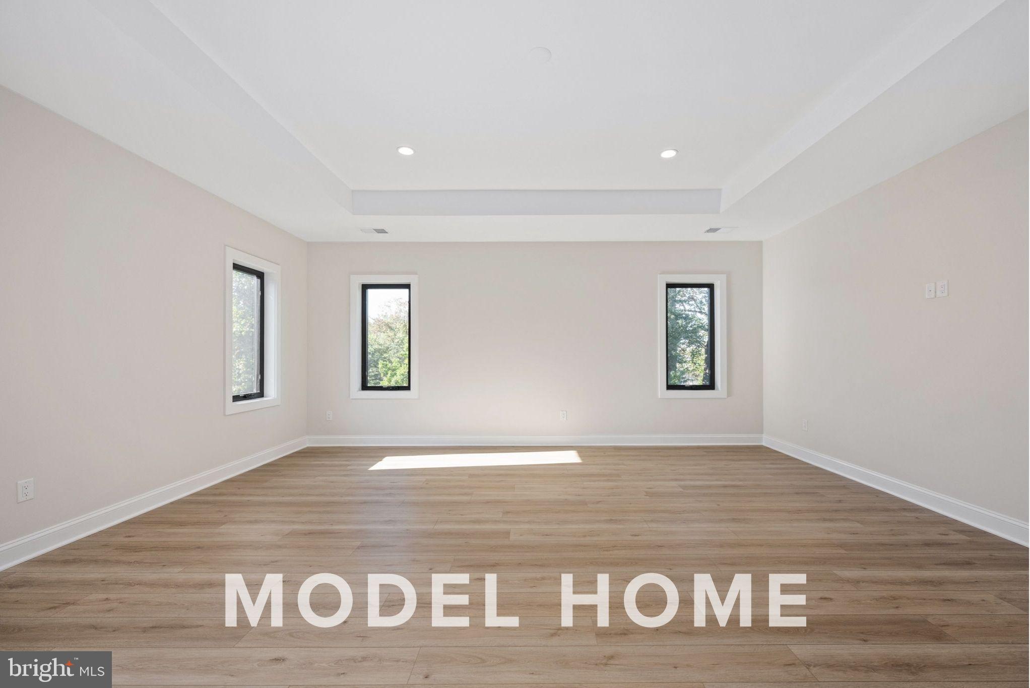 1901 Ware Road Falls Church, VA 22043 - Photo 29 of 39 a view of an empty room with wooden floor