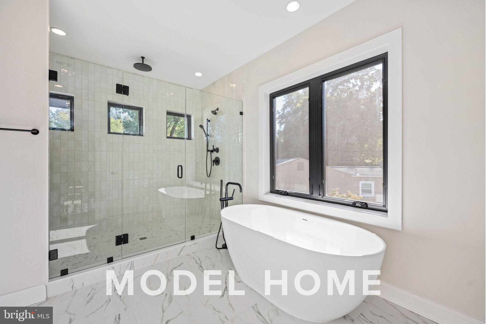 1901 Ware Road Falls Church, VA 22043 - Photo 30 of 39 a bathroom with a bathtub and a shower