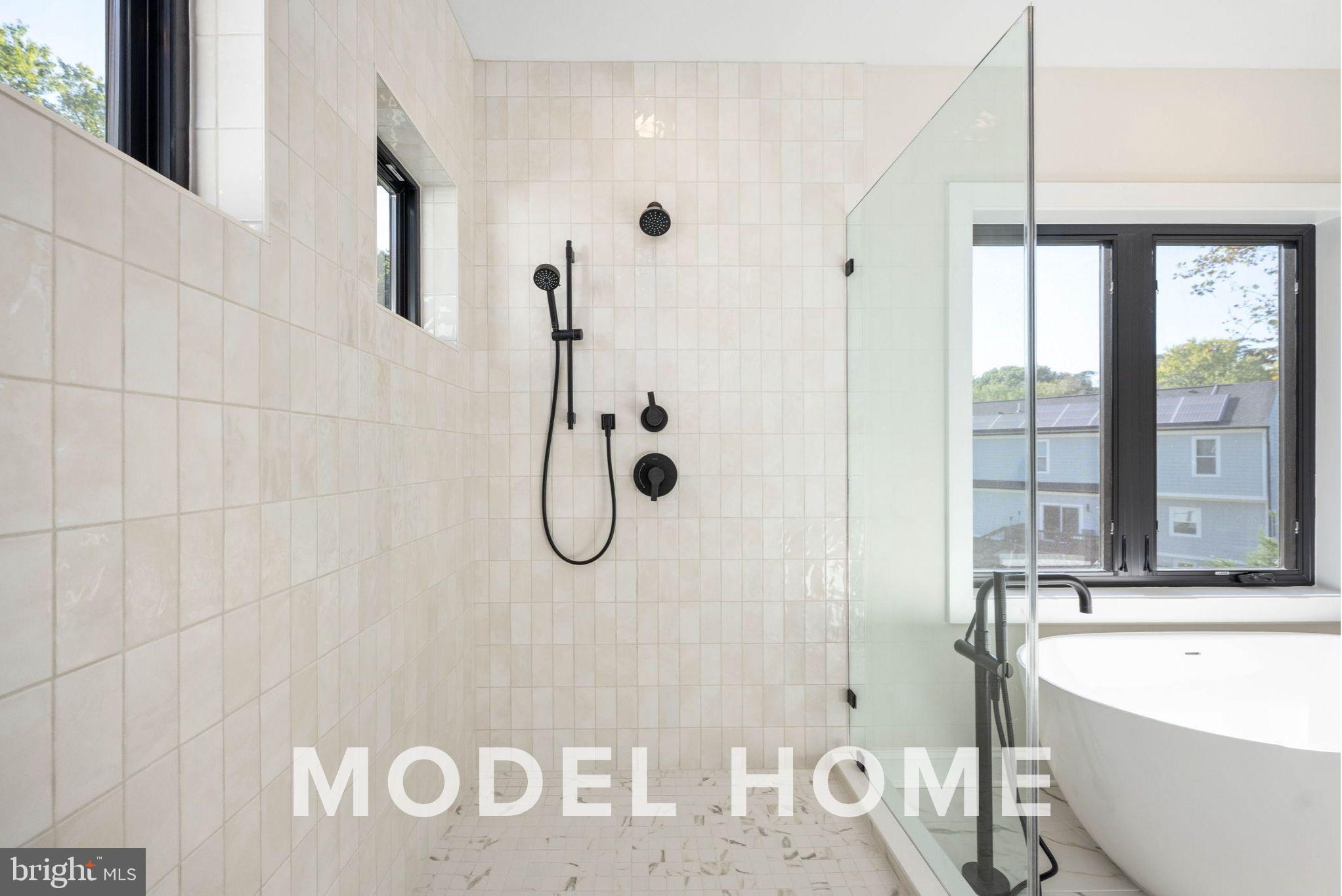 1901 Ware Road Falls Church, VA 22043 - Photo 32 of 39 a bathroom with a tub shower and a window