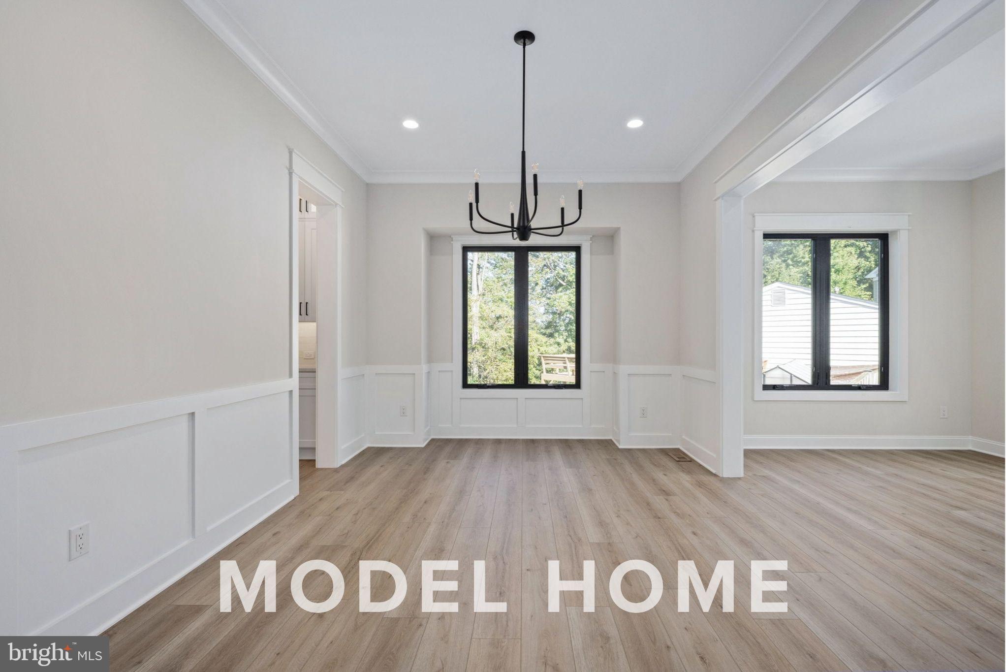 1901 Ware Road Falls Church, VA 22043 - Photo 7 of 39 a view of an empty room with a window and wooden floor