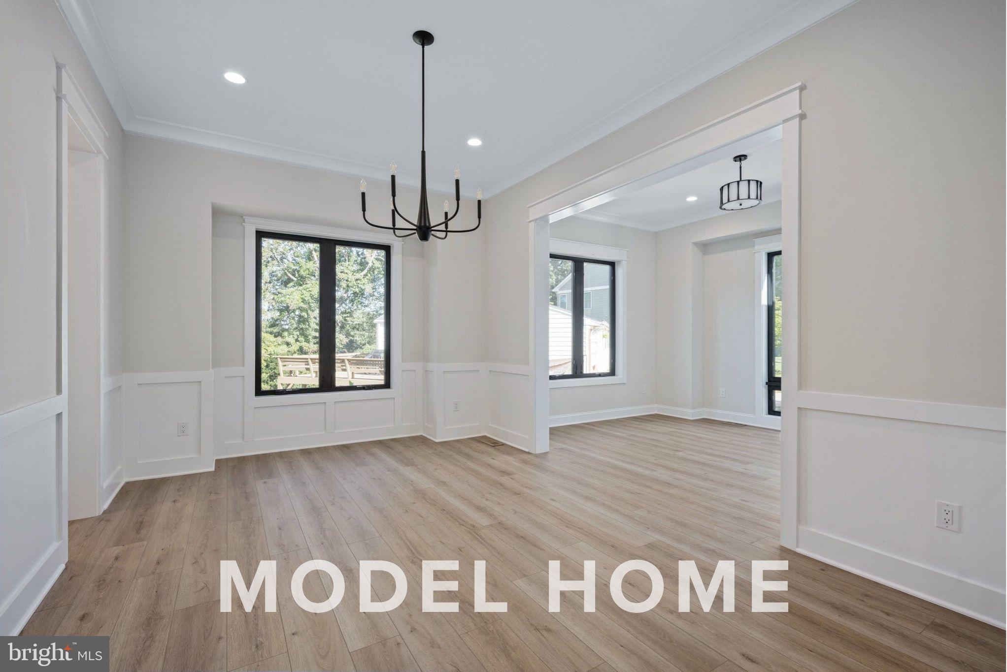 1901 Ware Road Falls Church, VA 22043 - Photo 8 of 39 a view of an empty room with window and wooden floor