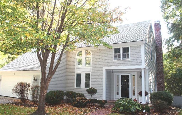 23 Tupelo Road Marstons Mills, MA 02648 - Photo 1 of 22 a front view of a house with garden