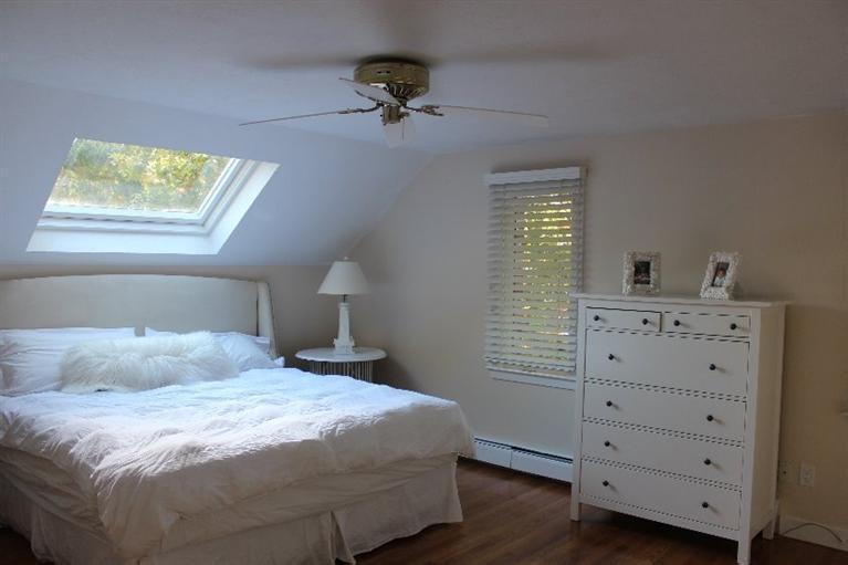 23 Tupelo Road Marstons Mills, MA 02648 - Photo 13 of 22 a bedroom with a bed and a window